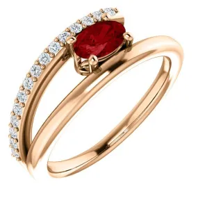 14KT GOLD 0.60 CT RUBY & 1/8 CTW DIAMOND BYPASS RING